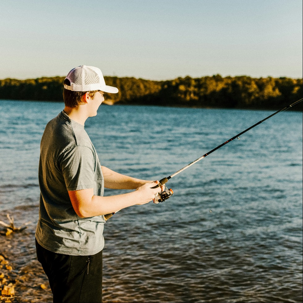 a person fishing on a lake